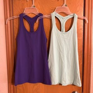 Two lululemon tanks size 6